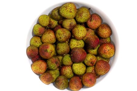 Fresh Chinese lychee bowl isolated on white background