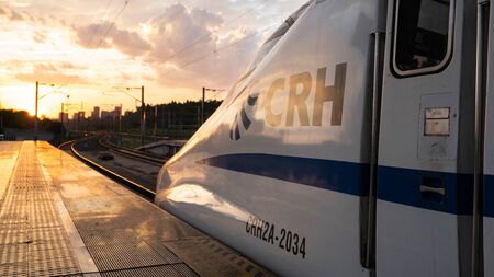 Yichang China, 11 August 2019 : Head of a CRH Chinese bullet train at sunset at Yichang station in...