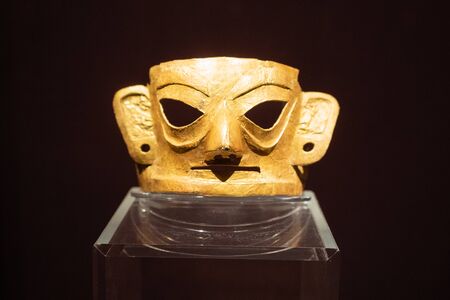 Chengdu China, 6 August 2019 : Gold mask from the Shu state kingdom at the Jinsha site museum exhibition Hall building in Chengdu Sichuan Chinaのeditorial素材
