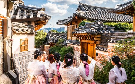 Seoul Korea , 23 September 2019 : Group of Asian tourists girls in traditional Korean Hanbok dressing at Bukchon Hanok village in Seoul South Koreaのeditorial素材