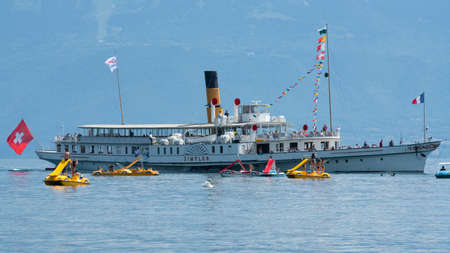 Lausanne Switzerland, 25 June 2020: Tourists on Simplon steam boat of the Belle Epoque fleet on...