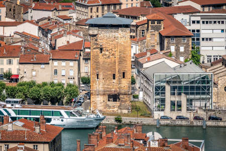 Vienne France, 11 July 2020: People seating at a cafe terrace in front of the Augustus and Livia temple an ancient roman temple in Vienne Franceのeditorial素材
