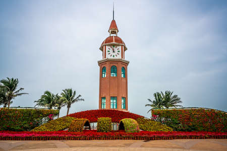 Front view of the Guanhaitai clock tower in Haikou Hainan Chinaの写真素材