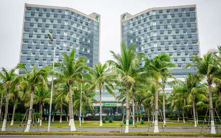 Haikou China, 23 March 2021: Holiday Inn Haikou West Coast Hotel front view in Hainan Chinaのeditorial素材