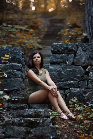 Woman on stone stairsの写真素材