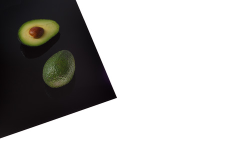Avokado on Black Sheet Isolated on white