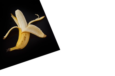 Banan on Black Sheet Isolated on whiteの写真素材