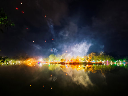Colorful fireworks on the lake at night in Chiang Mai, Thailandの写真素材
