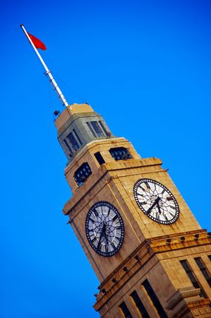 shanghai clock tower over a blue skyの写真素材