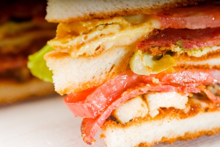  delicious classic club sandwich over a transparent glass dishの写真素材