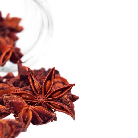 dried anise star spice illicium verum isolated on whiteの写真素材