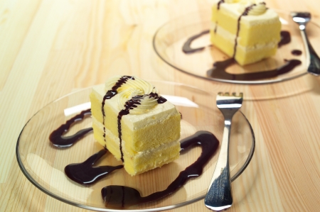 fresh cream cake closeup with chocolate sauce topping の写真素材