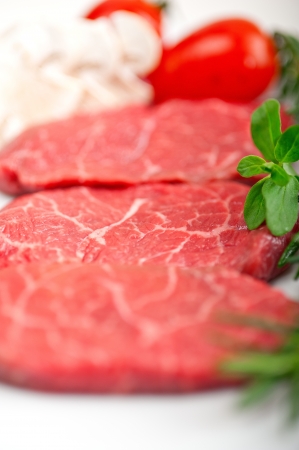 raw fresh Kobe Miyazaky beef with rosmary and marjoramの写真素材