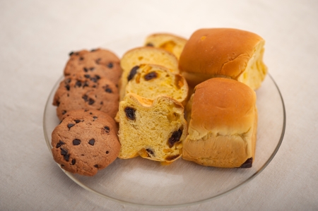 selection of sweet bread and cookies for breakfast