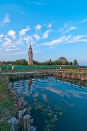 Venice Burano Mazorbo vineyard with campanile bell tower of Saint Caterina on backgroundのeditorial素材