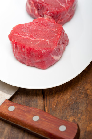 fresh raw beef filet mignon cut ready to cookの写真素材
