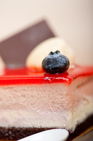 fresh strawberry yogurt mousse with macaroon and blueberry on topの写真素材