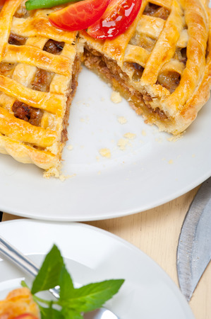 fresh baked home made beef pie macro closeupの写真素材