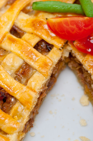 fresh baked home made beef pie macro closeupの写真素材