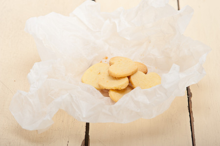 fresh baked heart shaped shortbread valentine day cookies on a paper wrapの写真素材