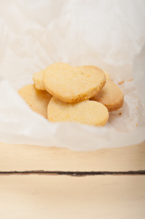 fresh baked heart shaped shortbread valentine day cookies on a paper wrapの写真素材