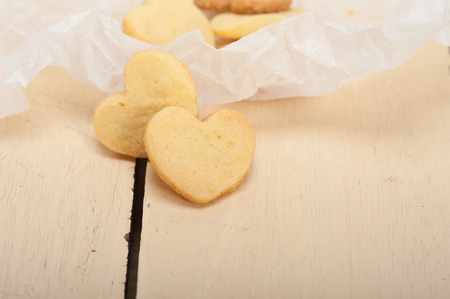 fresh baked heart shaped shortbread valentine day cookies on a paper wrapの写真素材