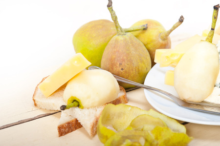 selection of cheese and fresh pears appetizer snackの写真素材