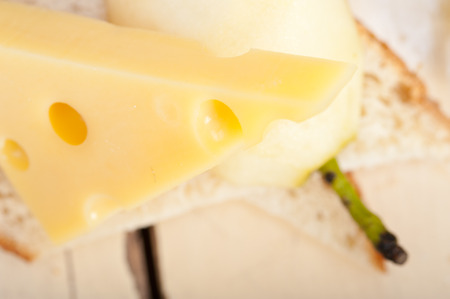 selection of cheese and fresh pears appetizer snackの写真素材