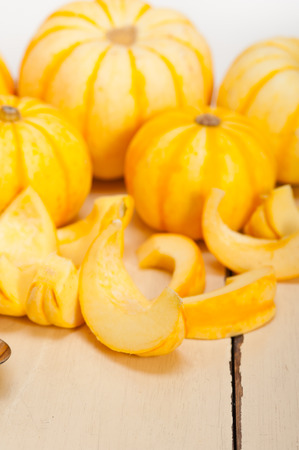 bunch of fresh yellow pumpkins just collected from gardenの写真素材