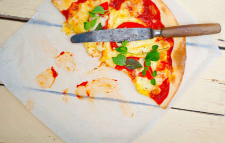 Italian traditional pizza Margherita tomato mozzarella and basilの写真素材