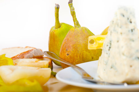 selection of cheese and fresh pears appetizer snackの写真素材