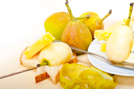 selection of cheese and fresh pears appetizer snackの写真素材
