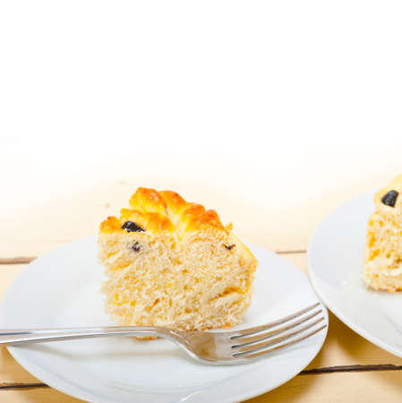 fresh home baked blueberry bread cake dessert over white wood table