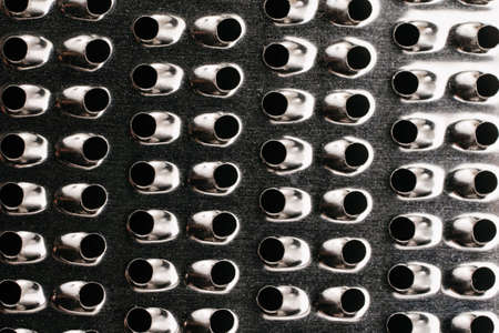 Close-up close-up of an iron cheese grater.の写真素材