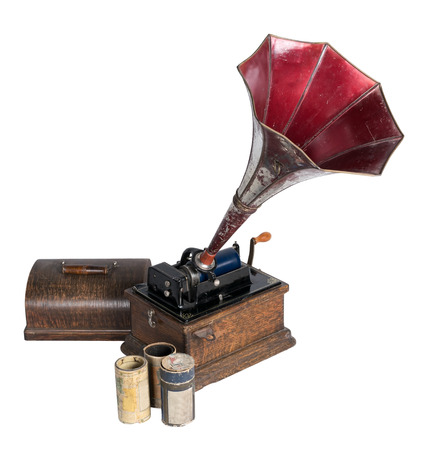 A 1911 old phonograph with three cylinder recordsの写真素材