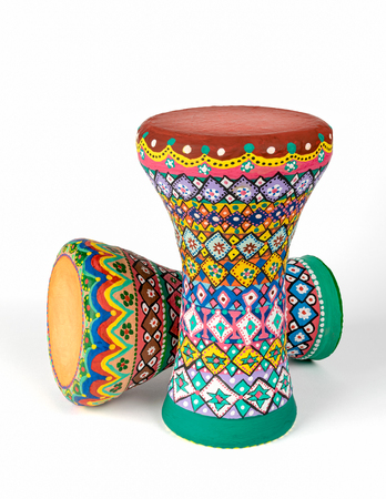 Front view of two colorful painted goblet drums (also chalice drum, tarabuka, darbuka, debuka,...