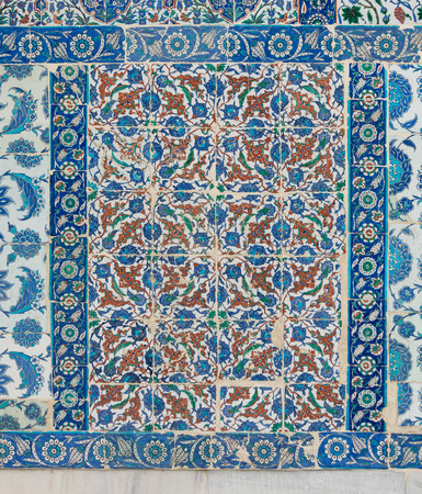 Old ceramic wall tiles with floral blue pattern in an exterior wall of the historic Eyup Sultan Mosque situated in the Eyup district, Istanbul, Turkeyのeditorial素材