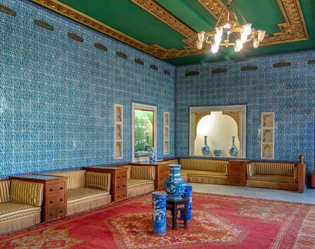Manial Palace of Prince Mohammed Ali. Blue tiled hall at the residence of the prince's mother with Turkish floral blue pattern ceramic tiles and niches with porcelain vases, Cairo, Egyptのeditorial素材