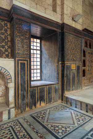Hall at ottoman era historic house of Moustafa Gaafar Al Seleehdar located at Al Darb Al Asfar District, Cairo, Egypt with decorated wooden wall and marble floorのeditorial素材