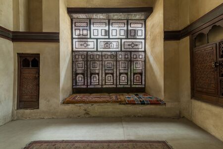 Hall at historic ottoman era El Sehemy house, with Interleaved wooden window - Mashrabiya, Moez...