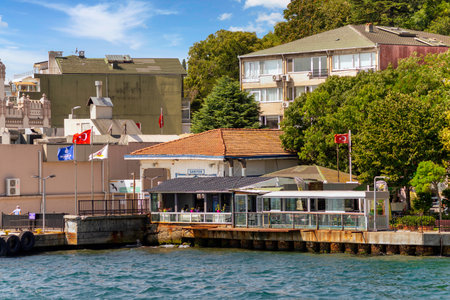 Istanbul, Turkey - August 29, 2022: Bosphorus Strait, Sariyer Ferry Terminal with dense green trees in the backgroundのeditorial素材