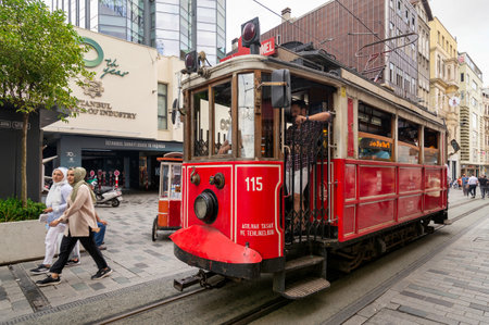 Istanbul, Turkey - August 25 2022: Nostalgic Taksim Tunel Red Tram, or tramvay, at Istiklal Street, Beyoglu district, central Istanbul, in a sunny summer dayのeditorial素材