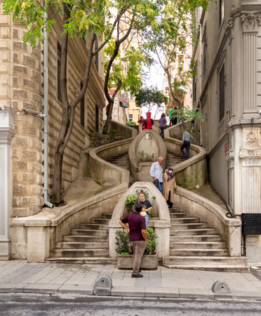 Istanbul, Turkey - August 25, 2022: Kamondo Stairs, a famous pedestrian stairway leading to Galata Tower, built around 1870, located on Banks Street in Galata, Karakoy districtのeditorial素材