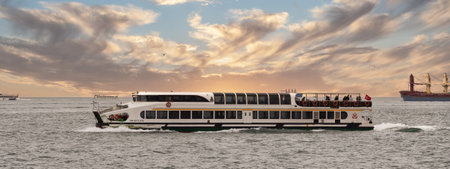 Istanbul, Turkey - May 7, 2023: Modern ferry boat sailing in Bosphorus strait in the early morningのeditorial素材