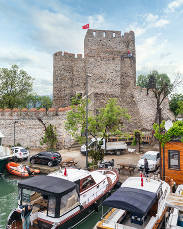 Istanbul, Turkey - May 17 2023: Morning shot of Goksu Stream, with docked boats, in front of Anadolu Hisari historic castle, located on the Anatolian side of the Bosporus in Beykoz districtのeditorial素材