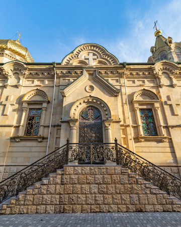 Ornate side entrance of Holy Myrrhbearers Cathedral, in Baku, Azerbaijan, characterized by intricate...