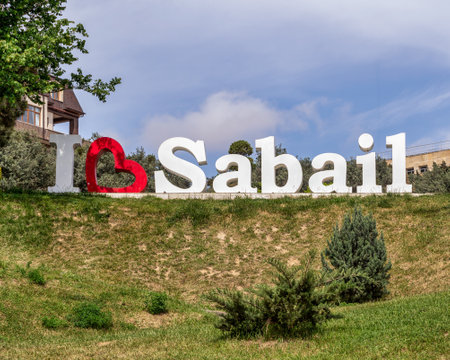 A view a large I Love Sabail sign in Sabail Park, Baku, Azerbaijan in a sunny spring day against a blue clear skyの写真素材