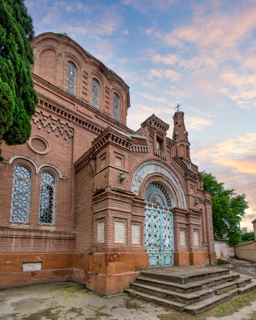 Stunning view of the entrance of Alexander Nevsky Church showcases its intricate red bricks architecture in Ganja, Azerbaijanの写真素材