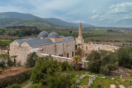 The architectural beauty of Selcuk Isa Bey Mosque in Selcuk, Izmir, turkey. Surrounding landscapes provide a serene backdrop, enriching the historical significance of the siteの写真素材
