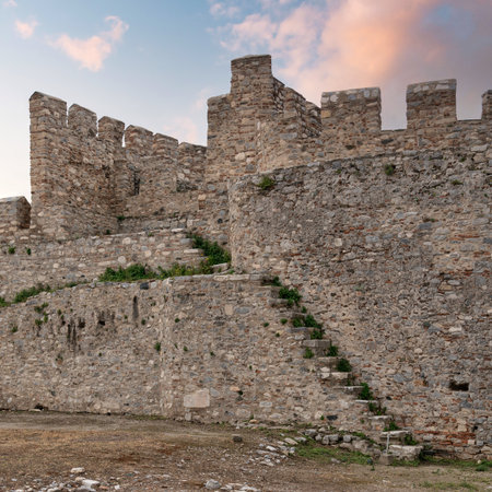 Ayasuluk Castles ancient stone walls, battlements, and integrated steps under a soft cloudy sky in Selcuk, Izmir, Turkeyの写真素材